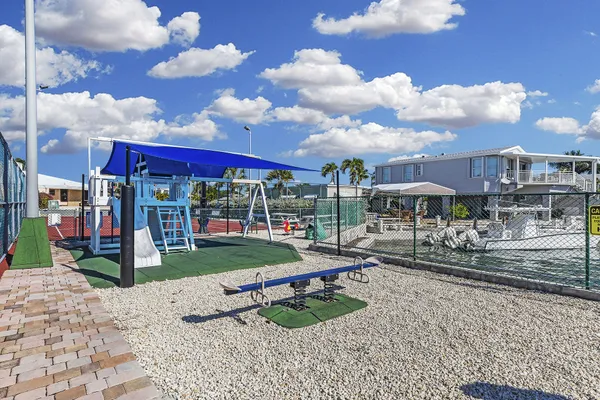 a basketball court with view of city