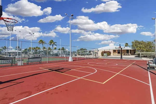 a view of a swimming pool with a lounge chairs