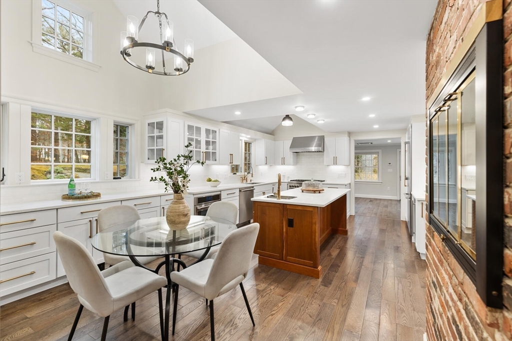156 Cherry Brook Road Weston, MA 02493 - Photo 1 of 30 a large kitchen with a table and chairs