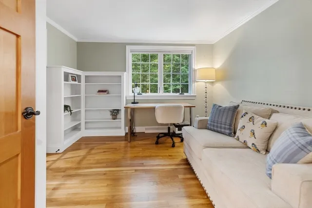 a living room with a couch and a table