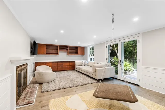 a living room with furniture and window