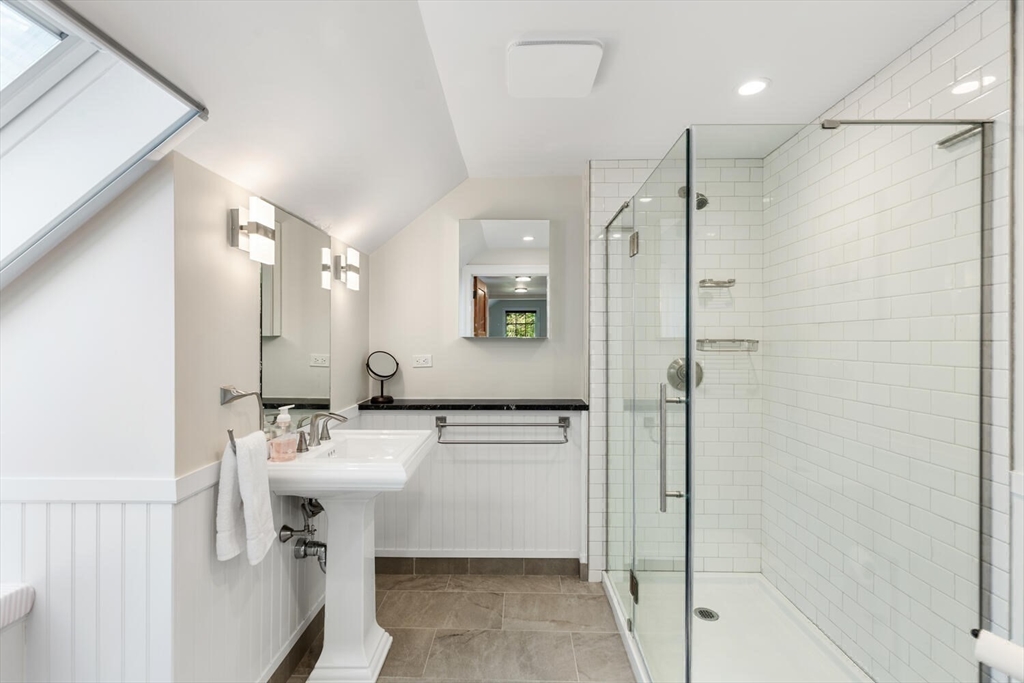156 Cherry Brook Road Weston, MA 02493 - Photo 24 of 30 a bathroom with a sink shower and a mirror