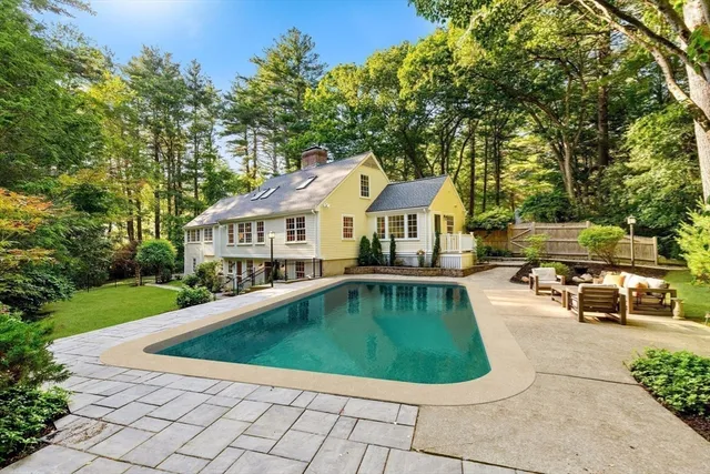 a view of a house with a swimming pool