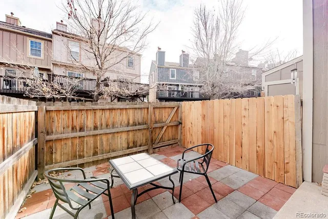 a view of a chairs and table on the terrace