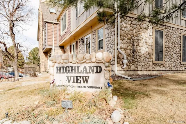 a sign that is on the side of a building