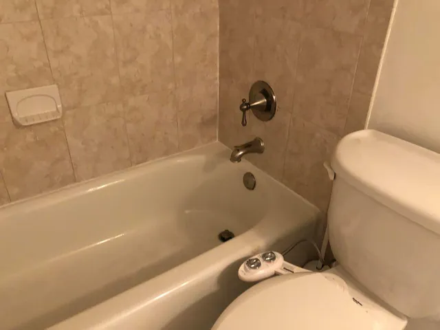 a view of balcony with wooden floor