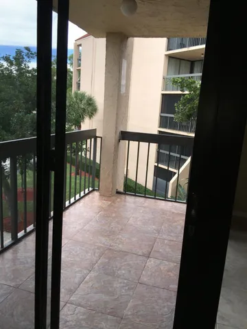 a kitchen with a stove and a microwave