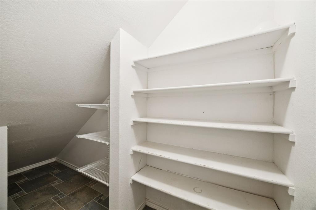 2604 Spring Lake Drive Richardson, TX 75082 - Photo 15 of 34 a view of an empty walk in closet