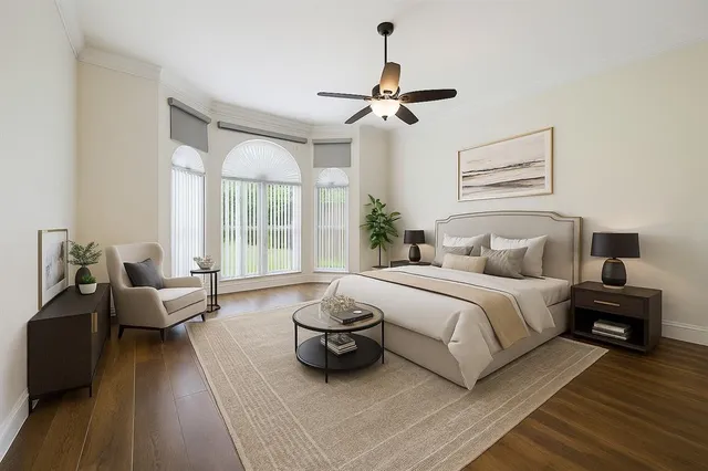 a bathroom with a tub a toilet and a shower