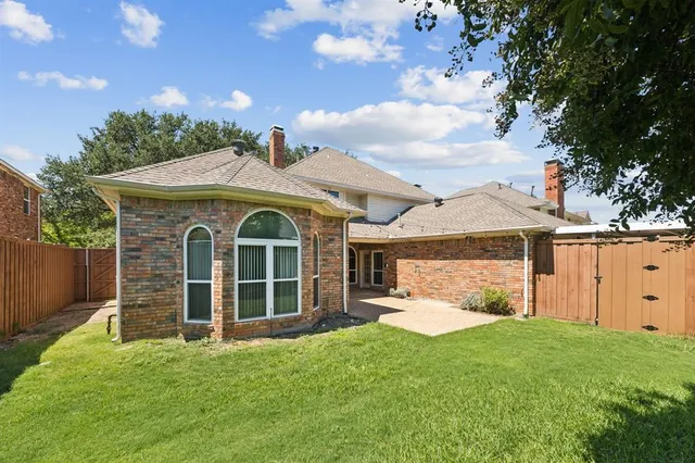 front view of house with a yard