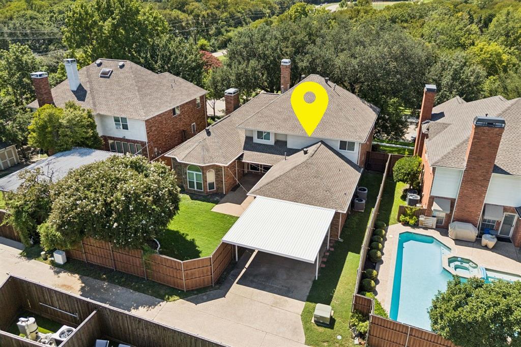 2604 Spring Lake Drive Richardson, TX 75082 - Photo 30 of 34 an aerial view of a house with a swimming pool yard and outdoor seating
