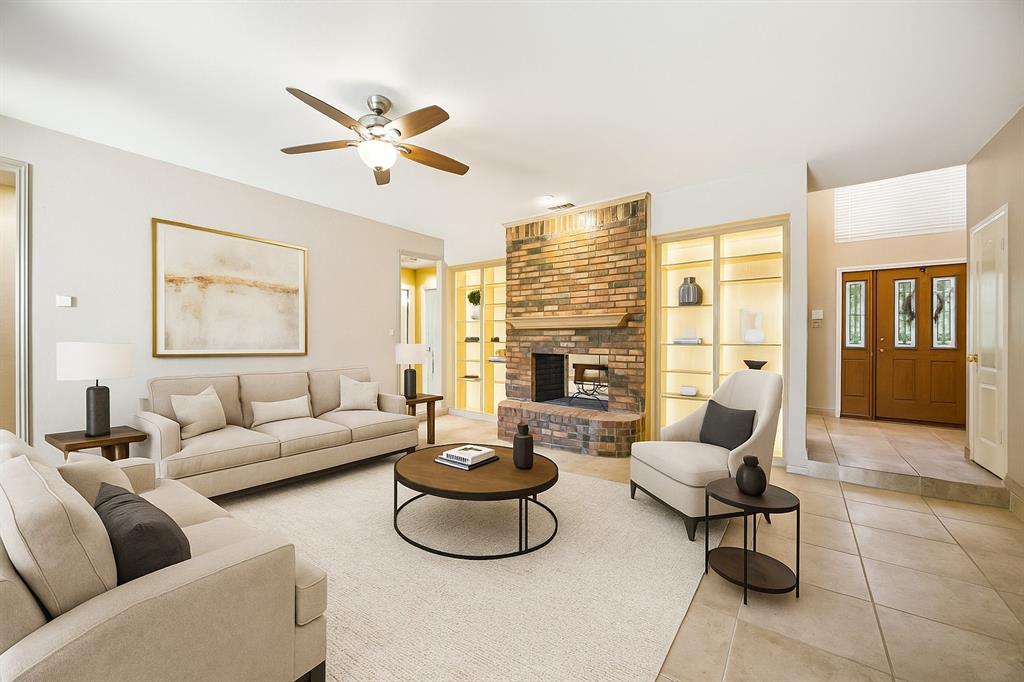 2604 Spring Lake Drive Richardson, TX 75082 - Photo 9 of 34 a living room with furniture and a large window