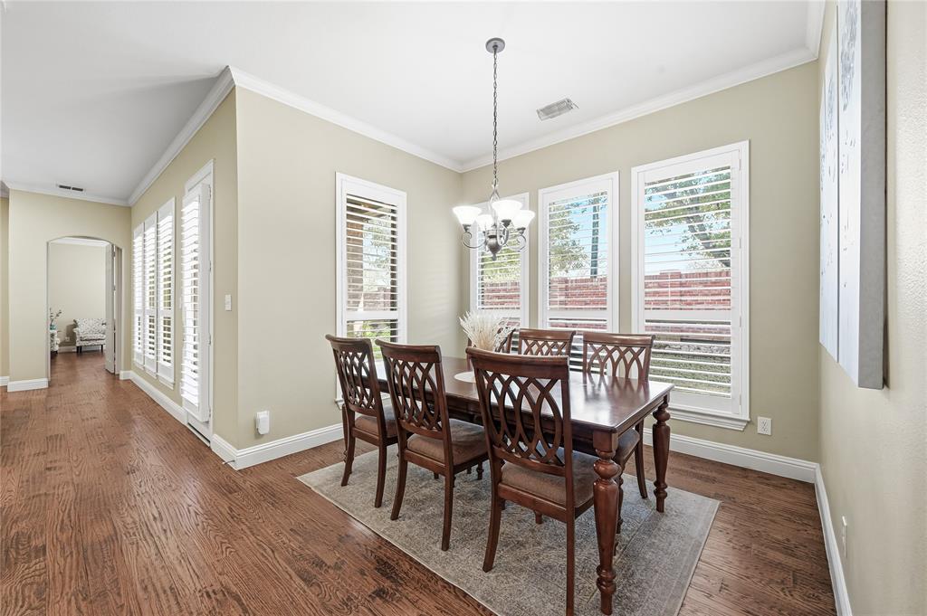 3200 Walnut Grove Place Flower Mound, TX 75022 - Photo 12 of 33 a view of a dining room with furniture window and wooden floor