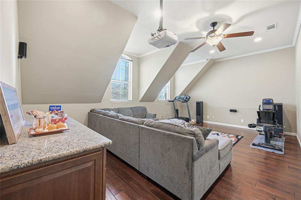 3200 Walnut Grove Place Flower Mound, TX 75022 - Photo 22 of 33 a living room with furniture and a wooden floor