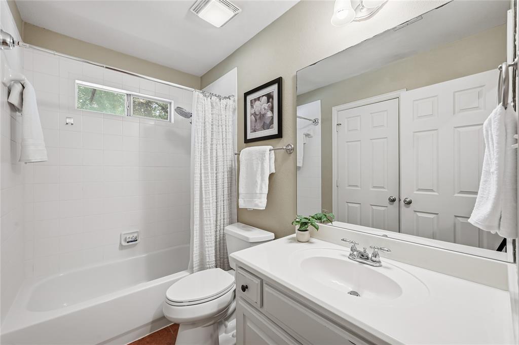 3200 Walnut Grove Place Flower Mound, TX 75022 - Photo 26 of 33 a bathroom with a sink toilet and shower
