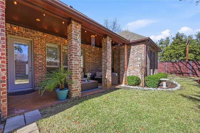 a backyard of a house with seating space