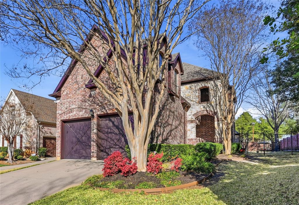 3200 Walnut Grove Place Flower Mound, TX 75022 - Photo 32 of 33 a front view of a house with garden