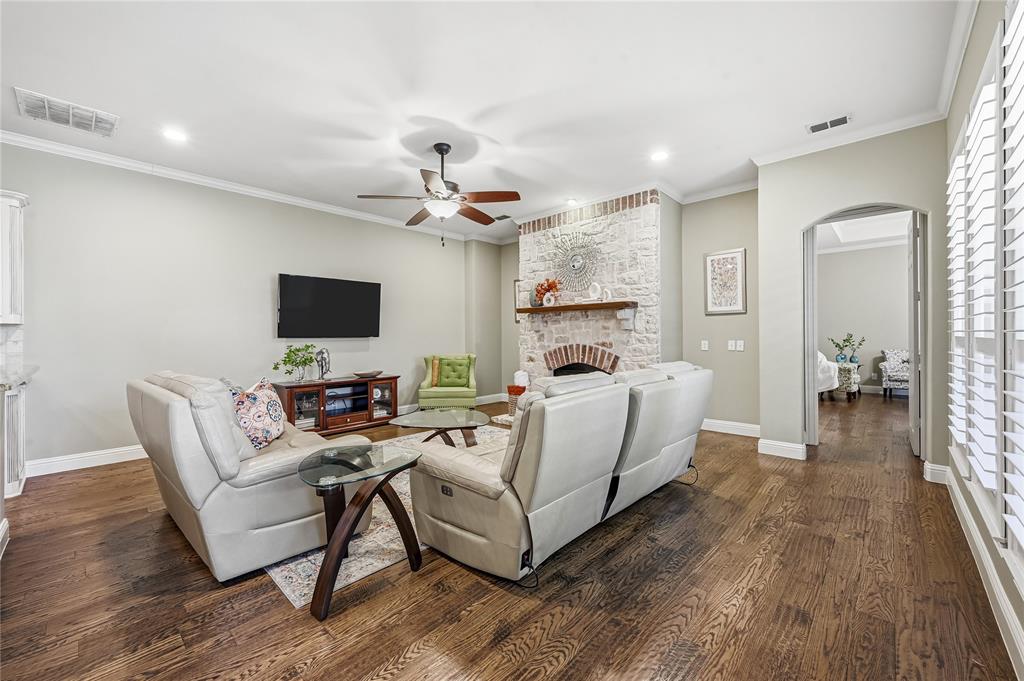 3200 Walnut Grove Place Flower Mound, TX 75022 - Photo 5 of 33 a living room with furniture and a flat screen tv