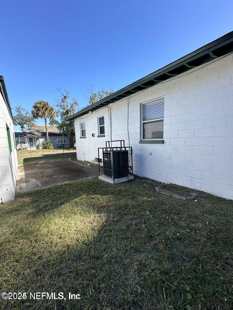 803 Crestwood Street Jacksonville, FL 32208 - Photo 14 of 14 a backyard of a house