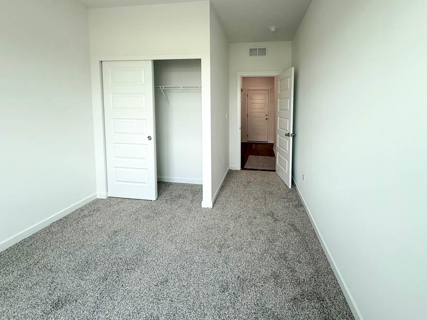 2459 Scribe Street Oswego, IL 60543 - Photo 13 of 27 an empty room with closet