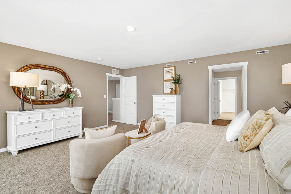 2459 Scribe Street Oswego, IL 60543 - Photo 16 of 27 a bedroom with a bed and a dresser