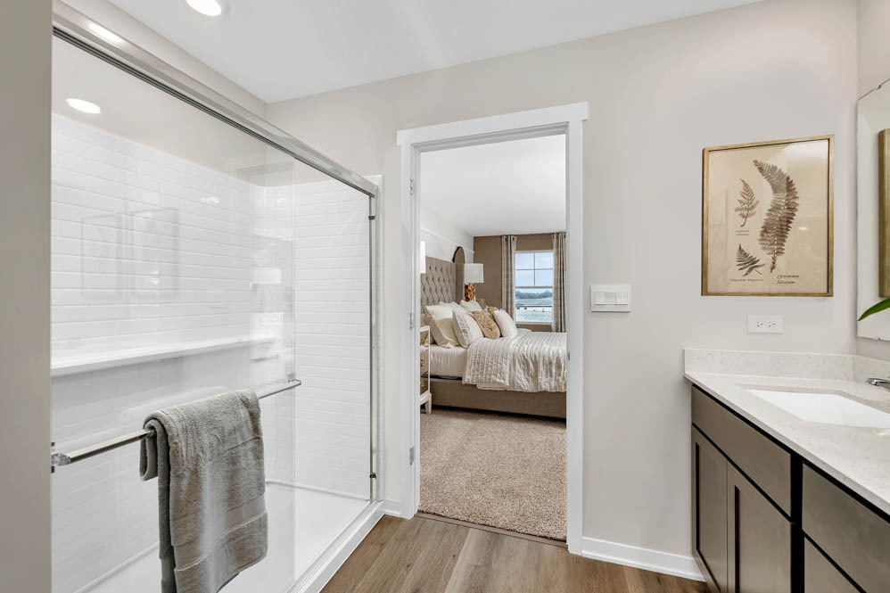 2459 Scribe Street Oswego, IL 60543 - Photo 18 of 27 a en suite bathroom with a tub shower and sink