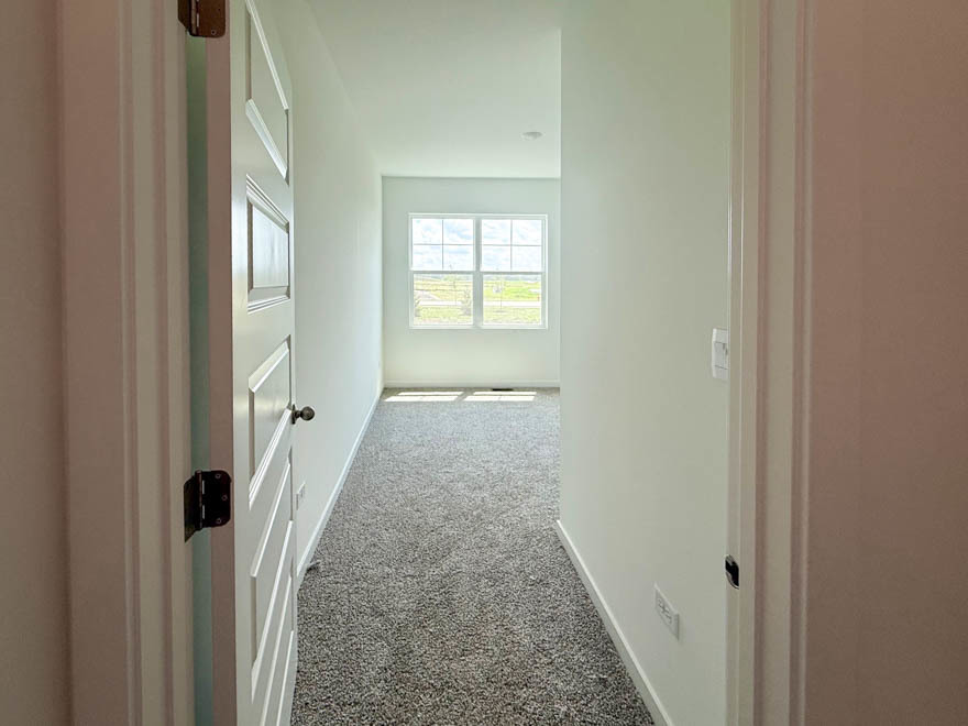 2459 Scribe Street Oswego, IL 60543 - Photo 10 of 27 a view of a hallway with windows