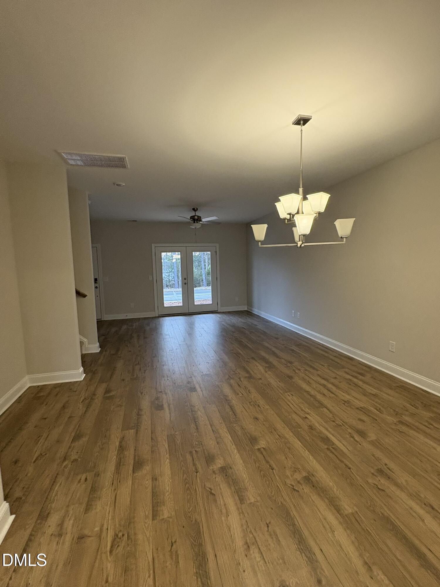 521 Forestville Road Wake Forest, NC 27587 - Photo 2 of 7 a view of empty room with wooden floor