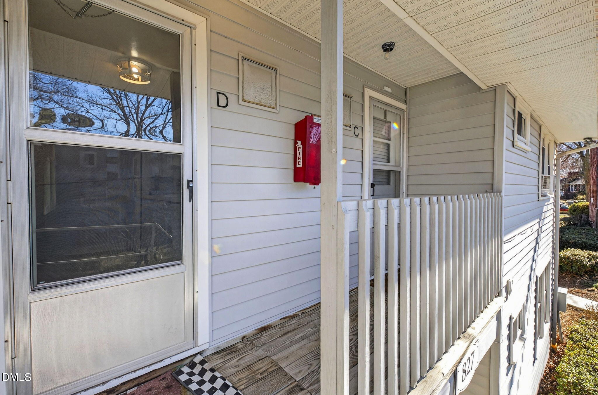 827 Daniels Street, Unit D Raleigh, NC 27605 - Photo 13 of 15 a view of a door and a window