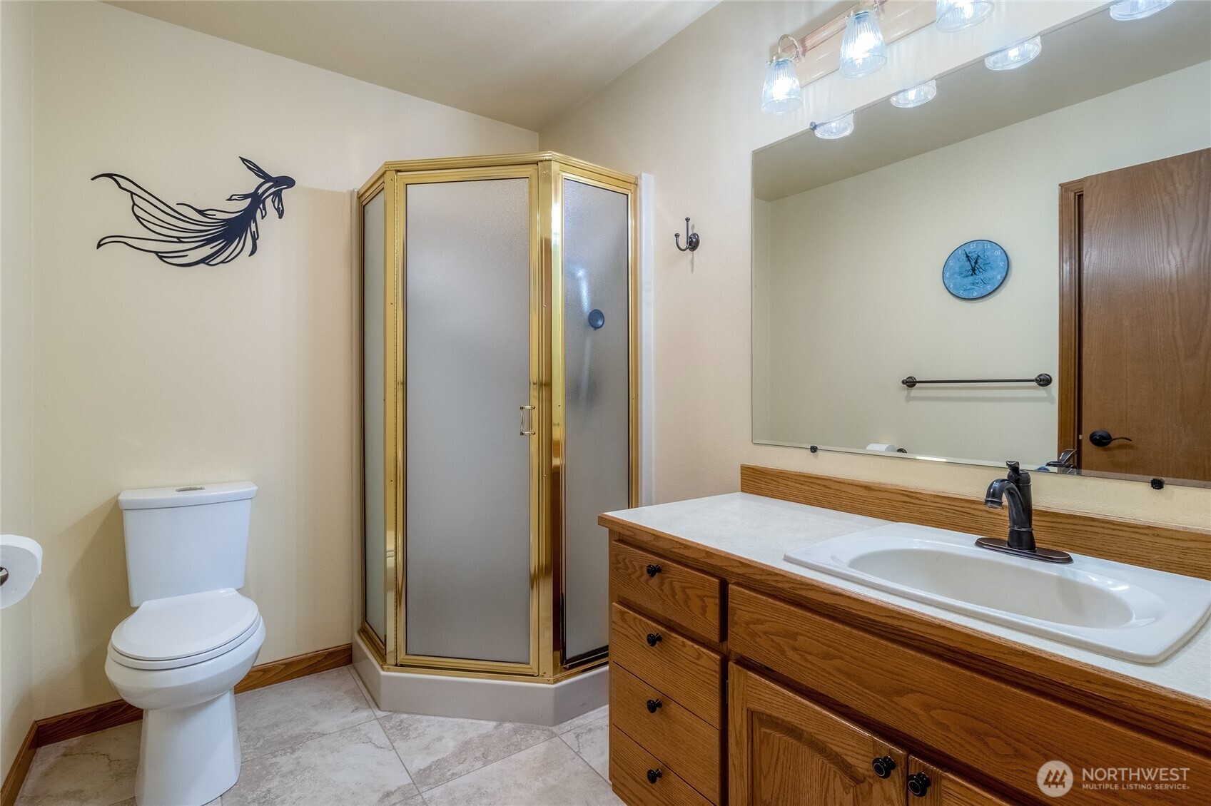 1343 Highland Road Walla Walla, WA 99362 - Photo 32 of 40 a bathroom with a sink a toilet and shower
