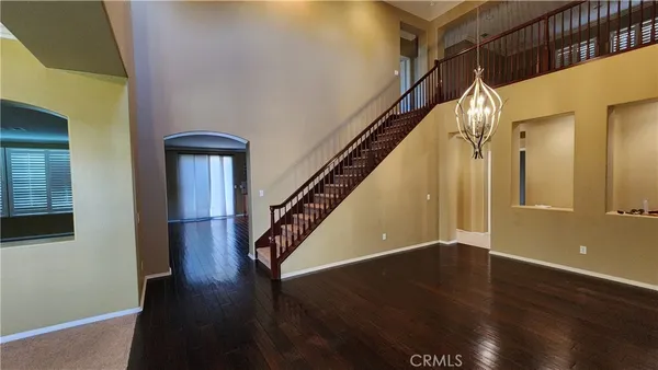 a view of entryway with wooden floor