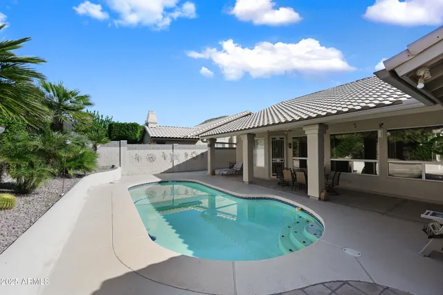 a bedroom with a bed and a cabinets