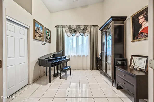 a spacious bathroom with a double vanity sink a mirror a bathtub and a shower