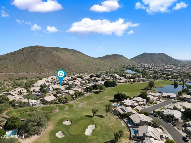 a kitchen with stainless steel appliances granite countertop sink stove and refrigerator
