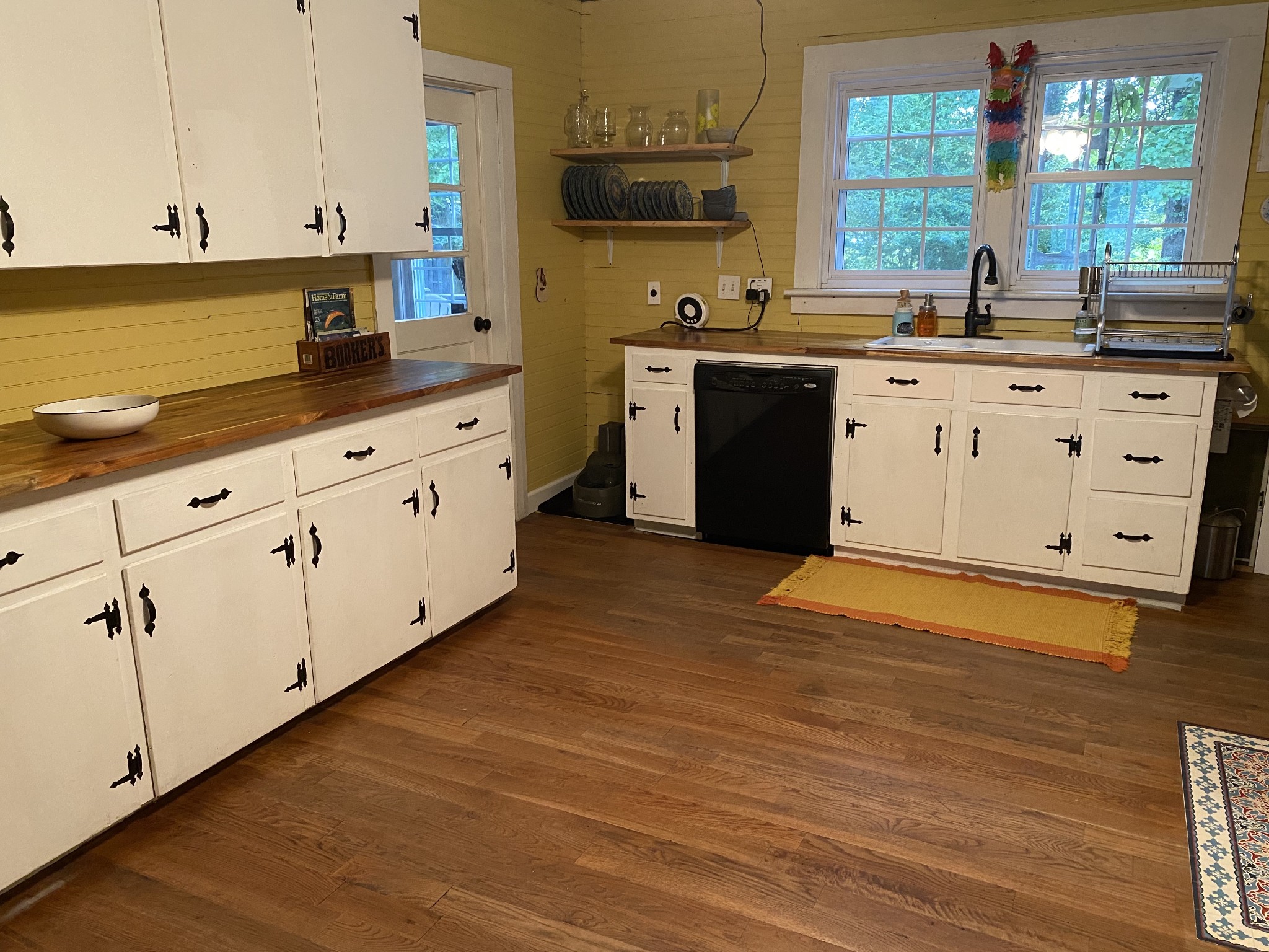 3104 Highway 41 Pelham, TN 37366 - Photo 8 of 16 a kitchen with granite countertop a sink cabinets and wooden floor
