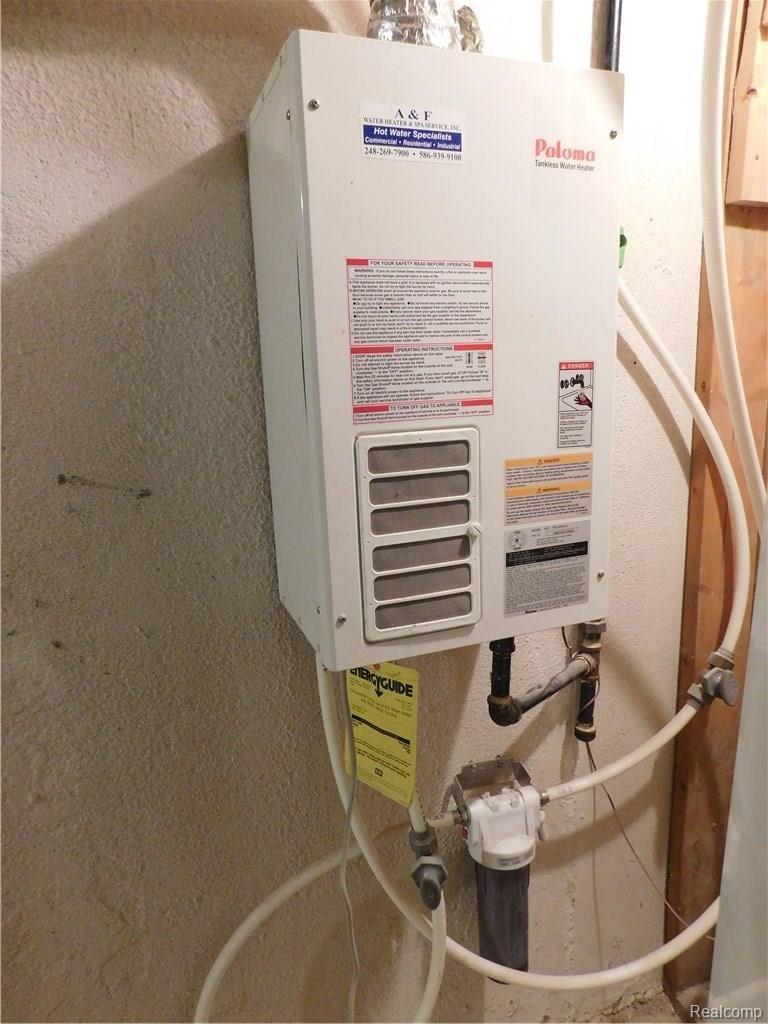 52077 Boland Road New Baltimore, MI 48047 - Photo 65 of 67 Tankless hot water tank