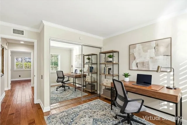 a living room with furniture a rug and a fireplace