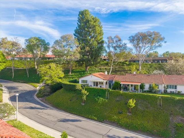 a view of a house with a big yard