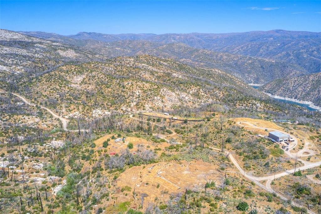 186 Harrison Springs Road Berry Creek, CA 95916 - Photo 22 of 22 a view of a mountain range in a cloudy sky