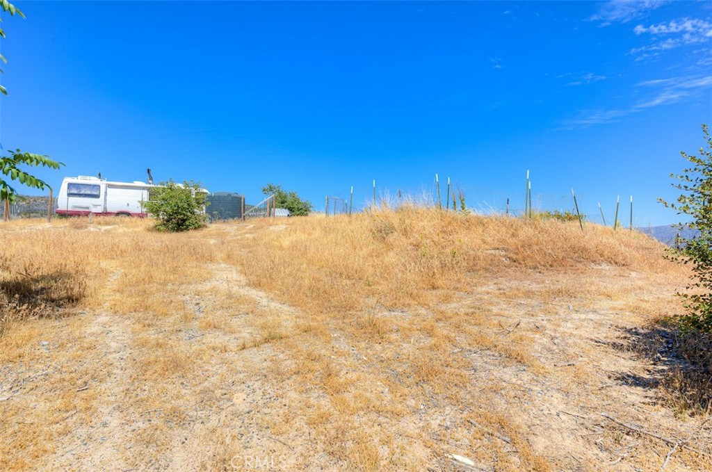 186 Harrison Springs Road Berry Creek, CA 95916 - Photo 3 of 22 a view of a backyard of the house