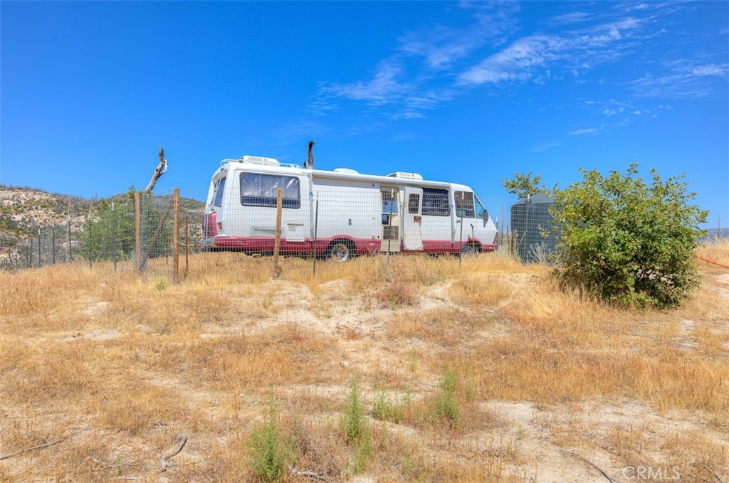 186 Harrison Springs Road Berry Creek, CA 95916 - Photo 4 of 22 a view of a house with a yard