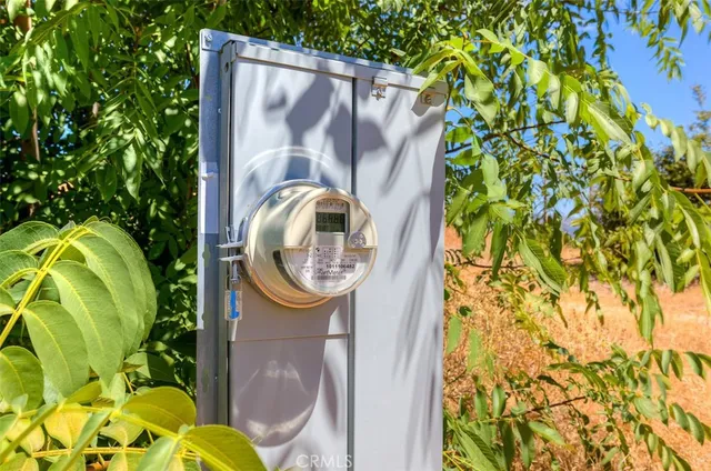 a view of a backyard with wooden fence