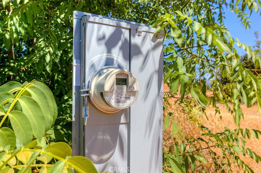 186 Harrison Springs Road Berry Creek, CA 95916 - Photo 9 of 22 a bathroom with a toilet and a shower curtain