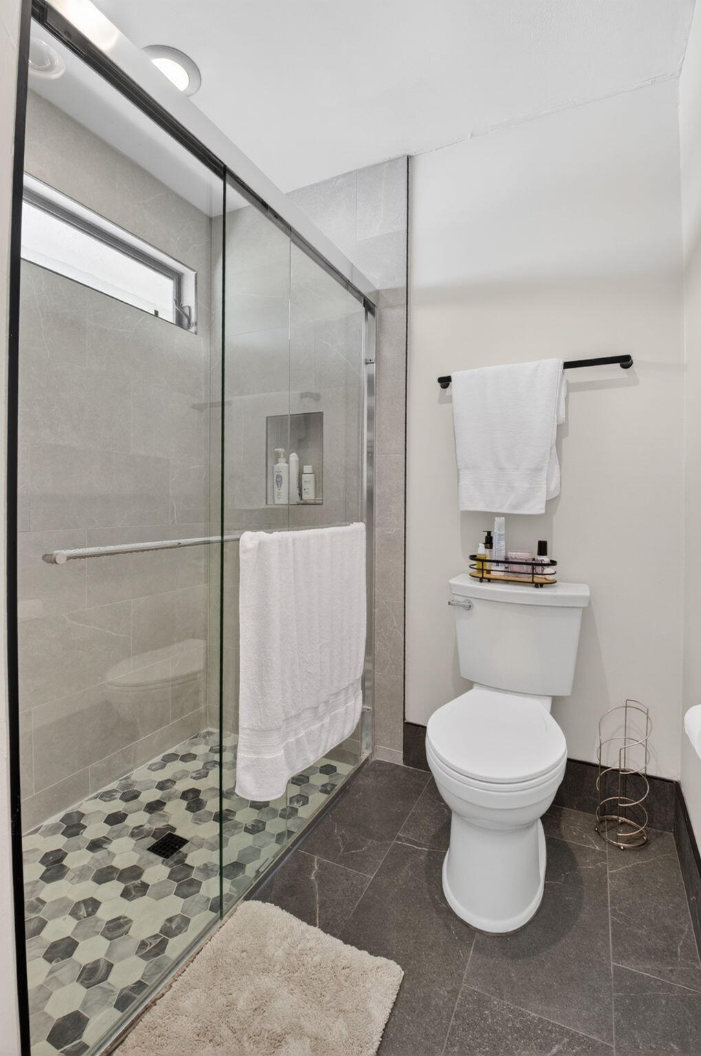 2360 Northwest 12th Street Delray Beach, FL 33445 - Photo 21 of 62 a bathroom with a toilet and a shower