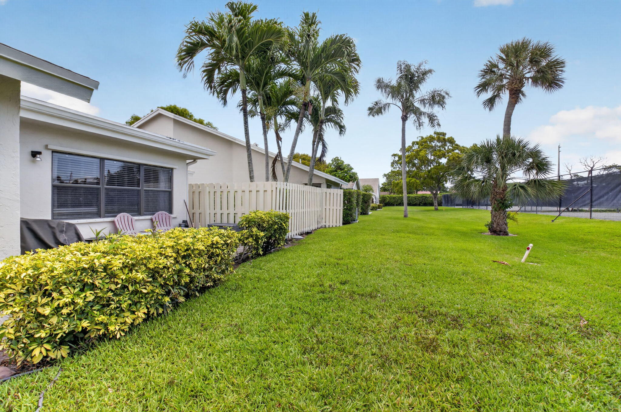 2360 Northwest 12th Street Delray Beach, FL 33445 - Photo 25 of 62 a view of a backyard with a garden