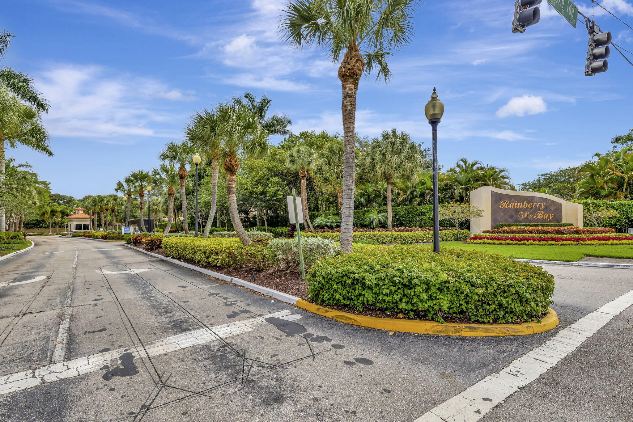 2360 Northwest 12th Street Delray Beach, FL 33445 - Photo 33 of 62 a front view of a house with a garden and yard