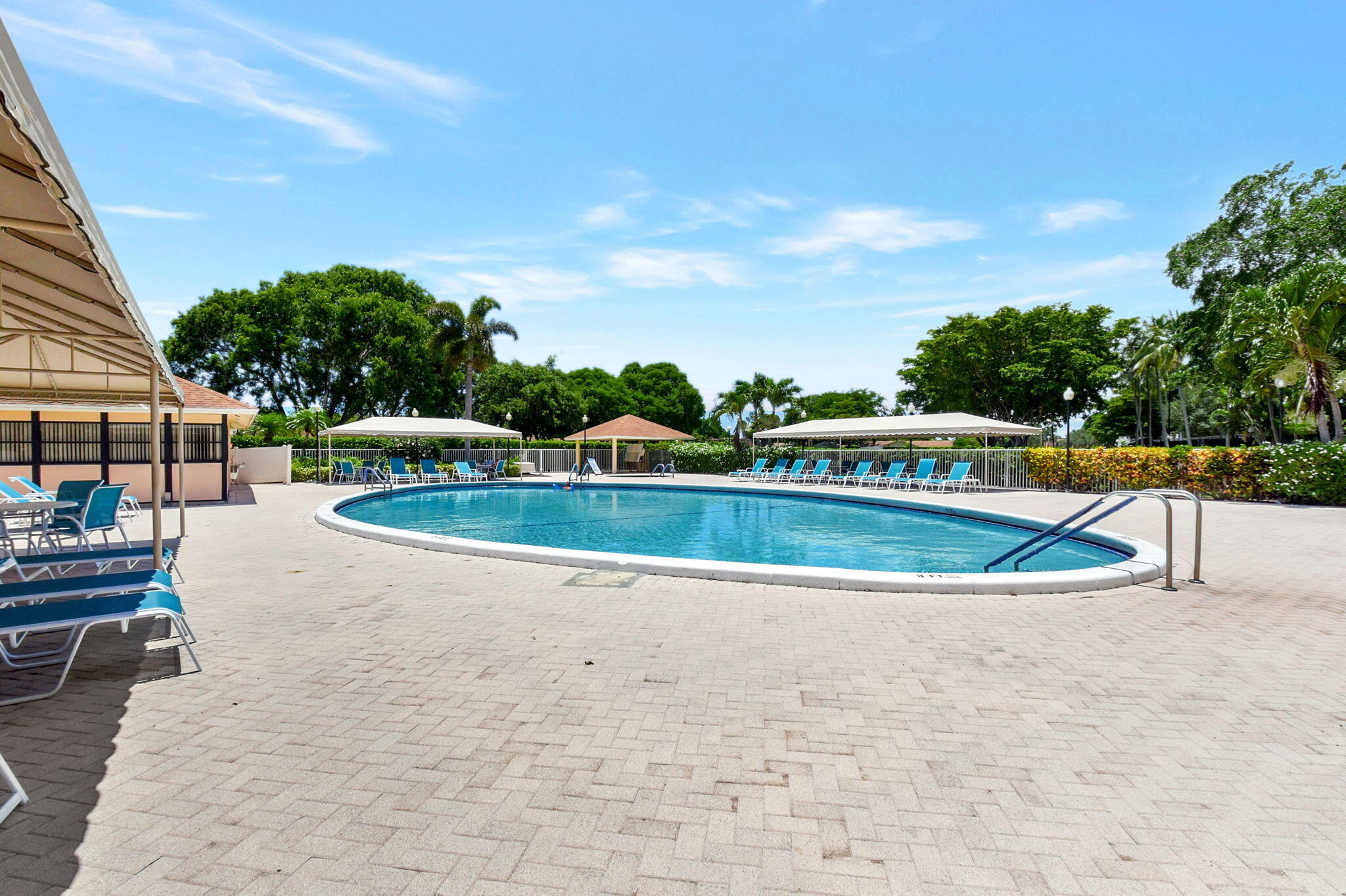2360 Northwest 12th Street Delray Beach, FL 33445 - Photo 49 of 62 a view of a swimming pool with a patio