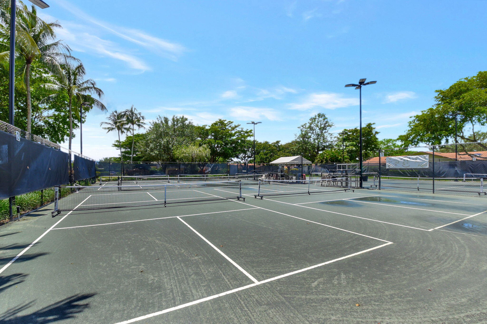 2360 Northwest 12th Street Delray Beach, FL 33445 - Photo 50 of 62 a view of a tennis court