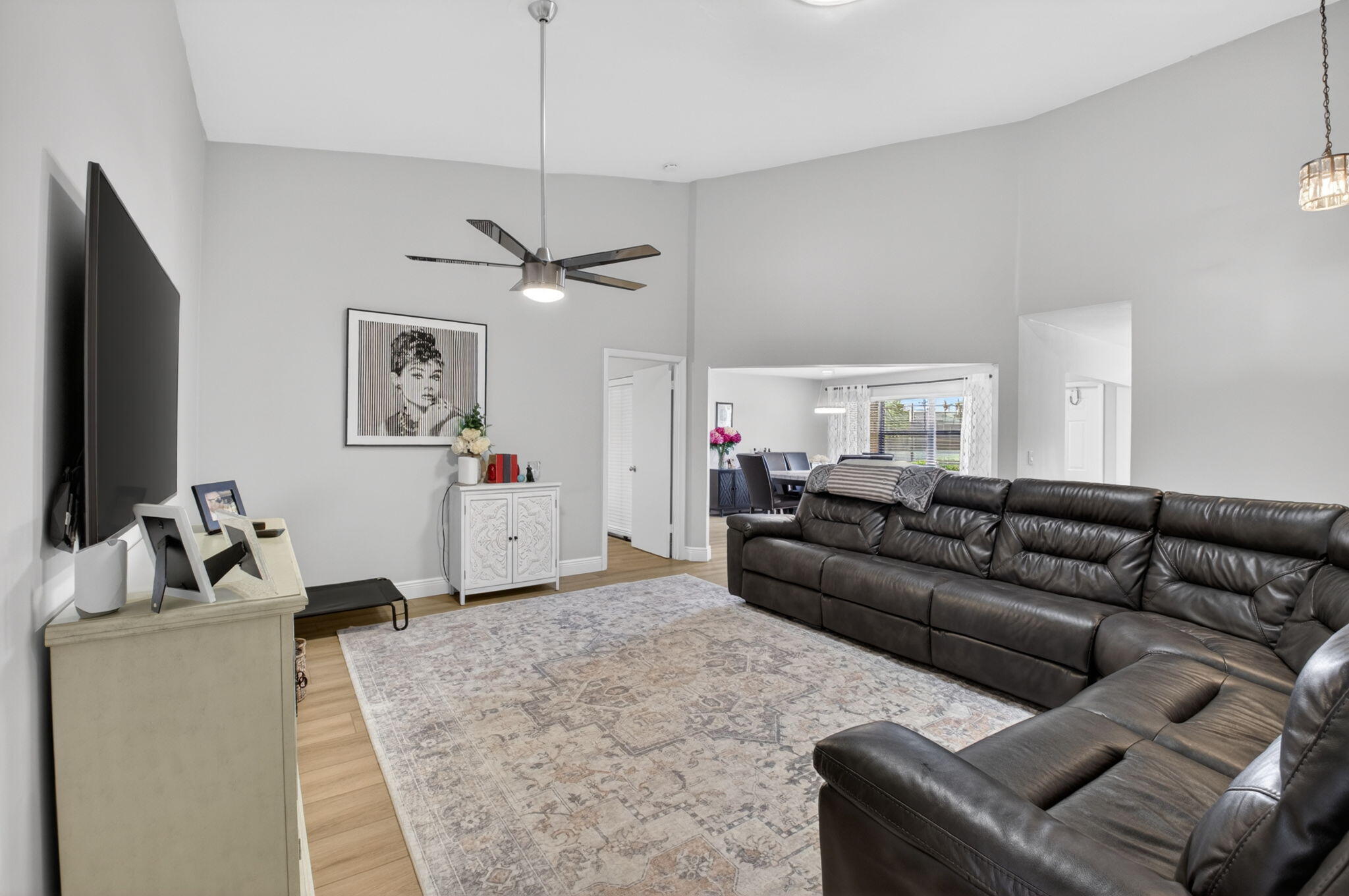 2360 Northwest 12th Street Delray Beach, FL 33445 - Photo 5 of 62 a living room with furniture and a flat screen tv