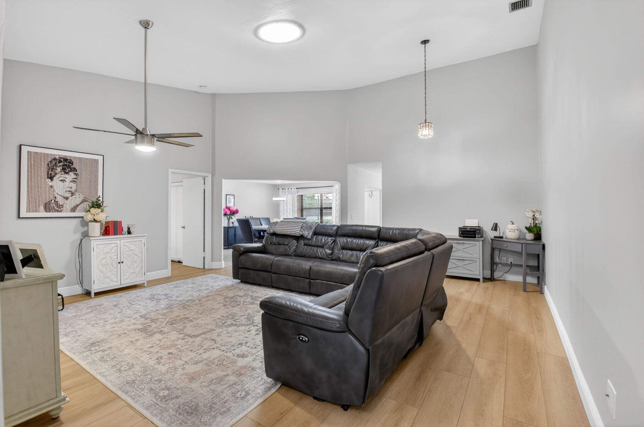 2360 Northwest 12th Street Delray Beach, FL 33445 - Photo 6 of 62 a living room with furniture and a wooden floor
